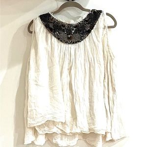 Stunning beaded color flowy top